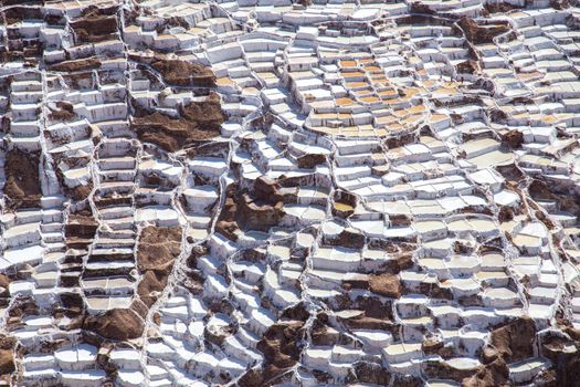 Maras, Peru - October 11, 2015: Salt evaporation ponds at the Maras salt mines