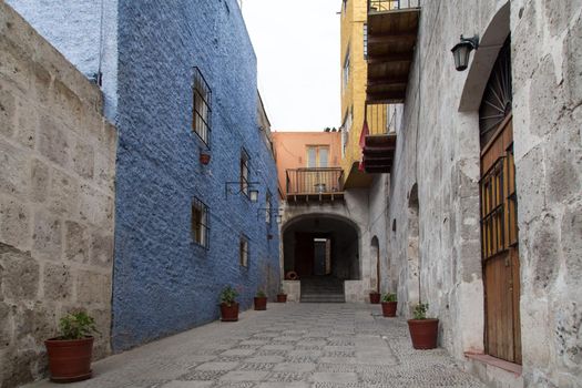 Arequipa, Peru - October 16, 2015: Colorful stone houses in a backyard