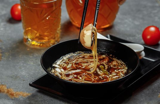 ramen with chicken and pork, SHOYU RAMEN chicken and pork with noodles.