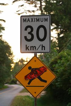 A Homemade Surfer Crossing Sign in Tofino British Columbia in Canada. High quality photo