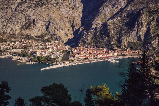 Old city. Kotor. Montenegro. Narrow streets and old houses of Kotor at sunset. View of Kotor from the city wall. View from above.