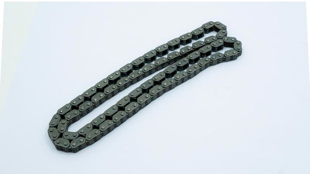 cam chain for 4-stroke valve engine for motorcycles. High quality photo