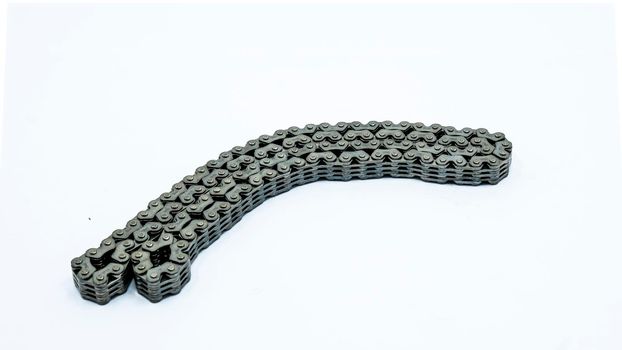 cam chain for 4-stroke valve engine for motorcycles. High quality photo
