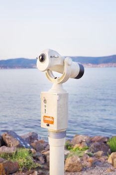 Telescope on the sea-summer, sun, sea beach