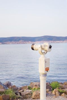 Telescope on the sea-summer, sun, sea beach