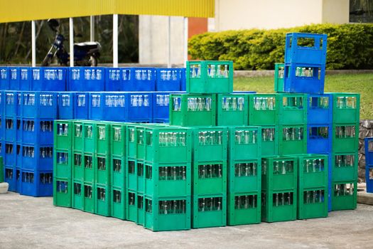 Empty Bottles in the box for recycle. Blurred background