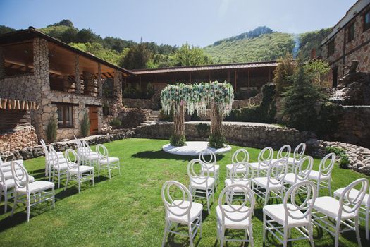 Outdoor wedding ceremony decoration at the hotel