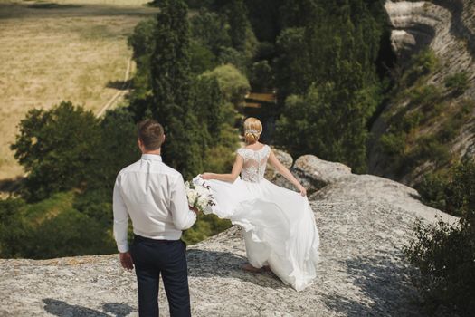 First meeting of bride and groom. Wedding. Emotions groom at the first meeting with beautiful bride. Wedding concept