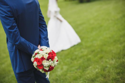 First meeting of bride and groom. Wedding. Emotions groom at the first meeting with beautiful bride. Wedding concept