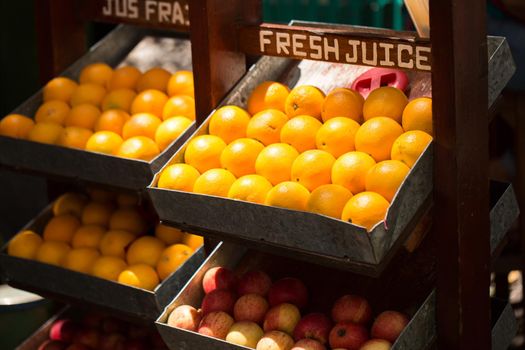 Juicy oranges in the market on display