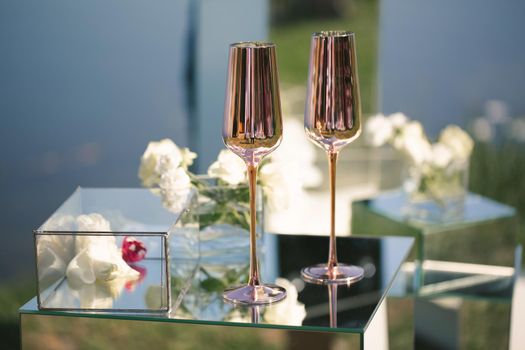 Wedding glasses with champagne on the table