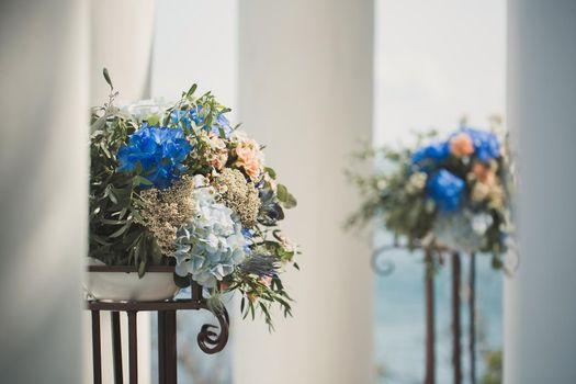 Decor of fresh flowers at the wedding ceremony.