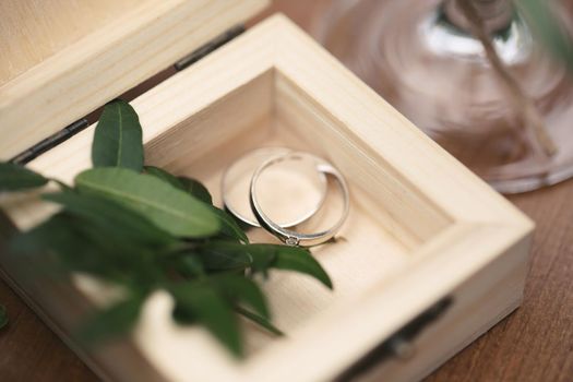 Gold wedding rings in a wooden box