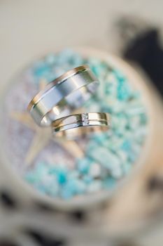 Wedding rings in a decorative jewelry box.