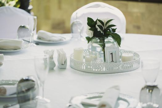 Beautifully decorated tables for guests with decorations