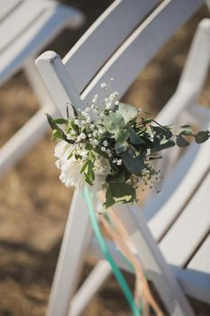 Close up of flower decorated on wedding chair