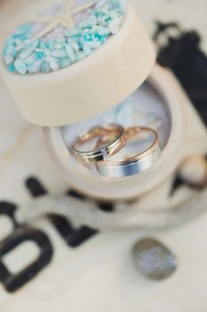 Wedding rings in a decorative jewelry box.