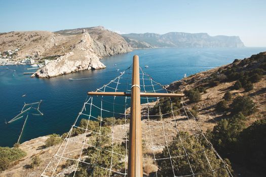 Luxurious wedding ceremony on a ship with a view of the sea and mountains.