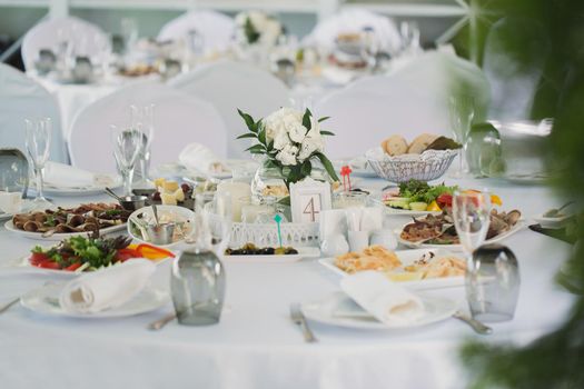 Beautifully decorated tables for guests with decorations