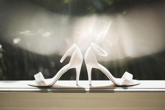 Elegant and stylish wedding shoes of the bride.