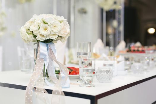 Served wedding banquet table with dishes in the restaurant