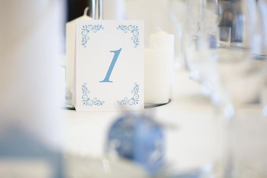 Guest table number. Wedding table in the restaurant.