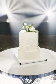 Beautiful wedding cake for the newlyweds at the wedding. A birthday cake at a banquet.