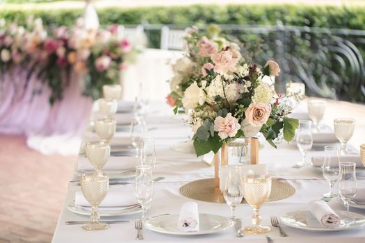 Luxurious setting of the wedding banquet table.