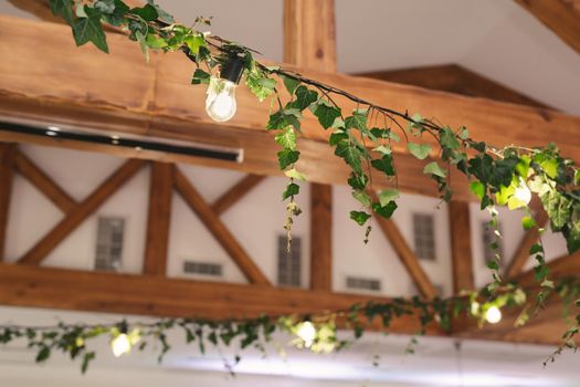 The decor of light bulbs in the restaurant hall.