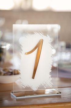 Guest table number. Wedding table in the restaurant.