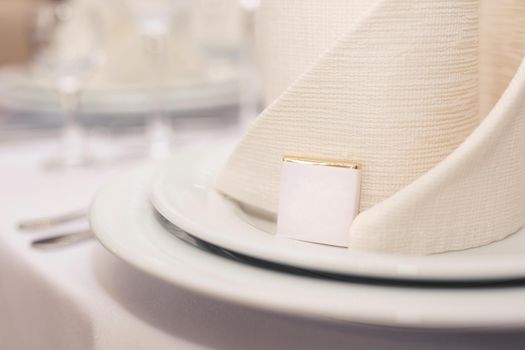 Beautiful setting of the wedding banquet table in the restaurant.