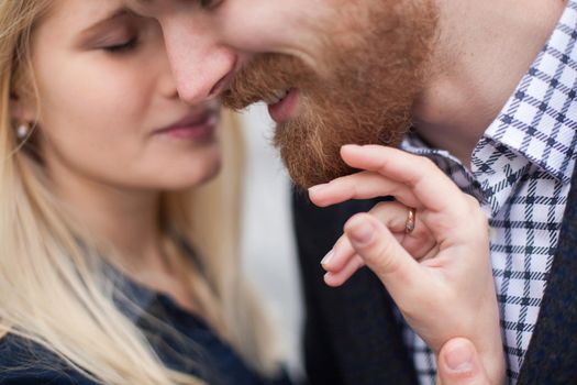 Portrait of a man with a beard and girls.