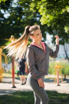 Sport outdoor. Beautiful girl on the street