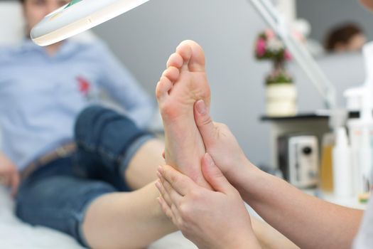 Close up of a foot massage at the spa