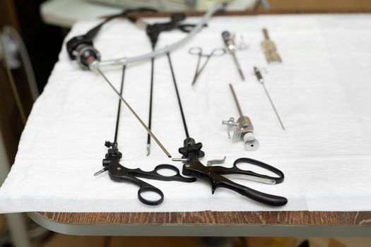 Laparoscopic instruments on the operating table in the surgical room