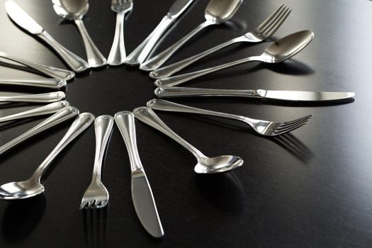 Cutlery on a black background. Fork, spoon knife