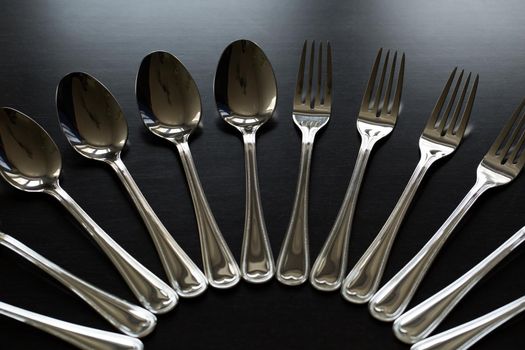 Cutlery on a black background. Fork, spoon knife