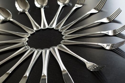 Cutlery on a black background. Fork, spoon knife