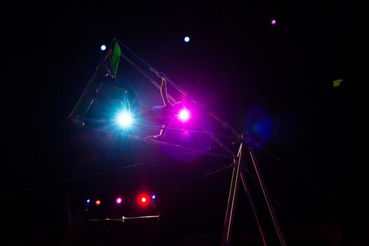 acrobats in the circus perform a complex trick