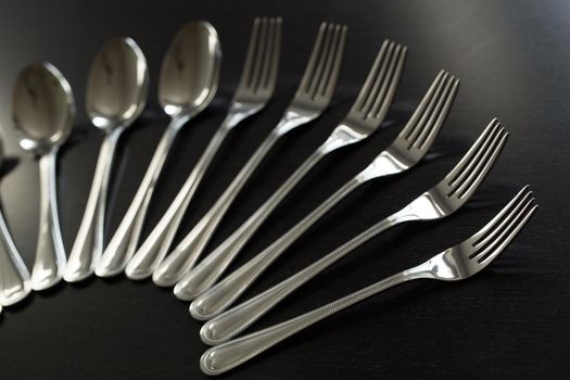 Cutlery on a black background. Fork, spoon knife