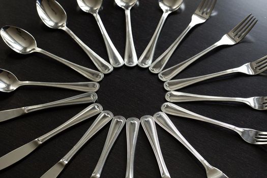 Cutlery on a black background. Fork, spoon knife