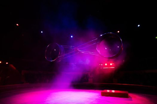 acrobats in the circus perform a complex trick