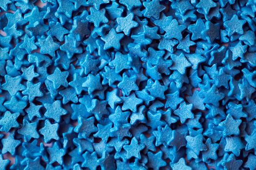 Background of small stars for decorating sweets.