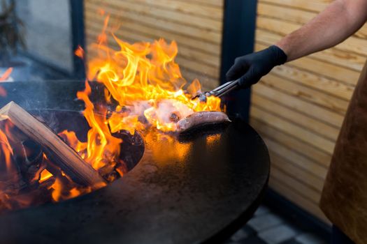 Sausage on Barbeque Smoker Grill. Hot and smoked sausage. Food Festival