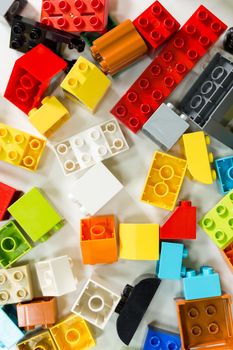 Plastic toy blocks on a white background
