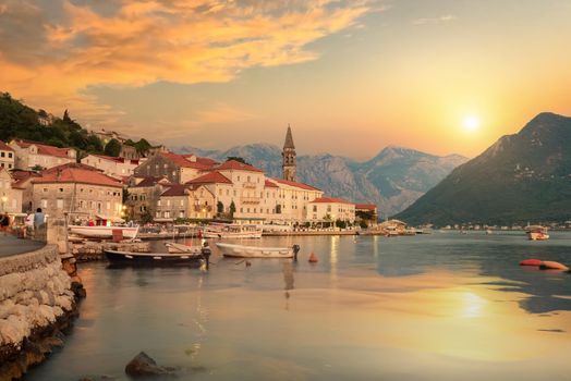 Historic city of Perast in the Bay of Kotor in summer at sunset