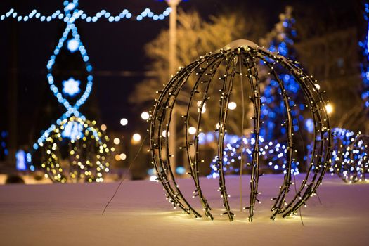 Christmas tree on the main Square on a winter night in snow