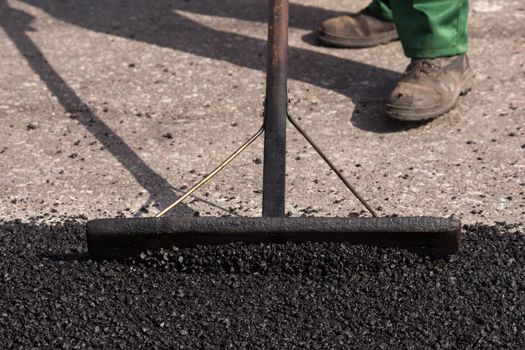 Repair of roads on the street, asphalt close-up