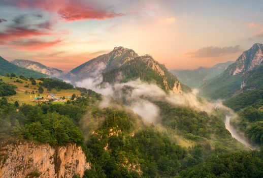 Montenegro, panorama mountains and of sunset sky over world famous tara river. Canyon near city Zabljak 