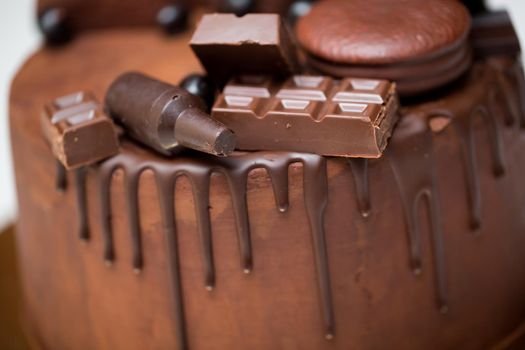 Chocolate cake with chocolate decoration, chocolate ganache